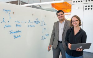 EBI researchers Corinne Scown and Amit Gokhale at the EBB on UC Berkeley campus - research in producing biofuel for jet airplanes.  (Photo by Roy Kaltschmidt)
